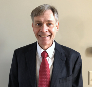 John P. Schefke, Senior Controller & Director
